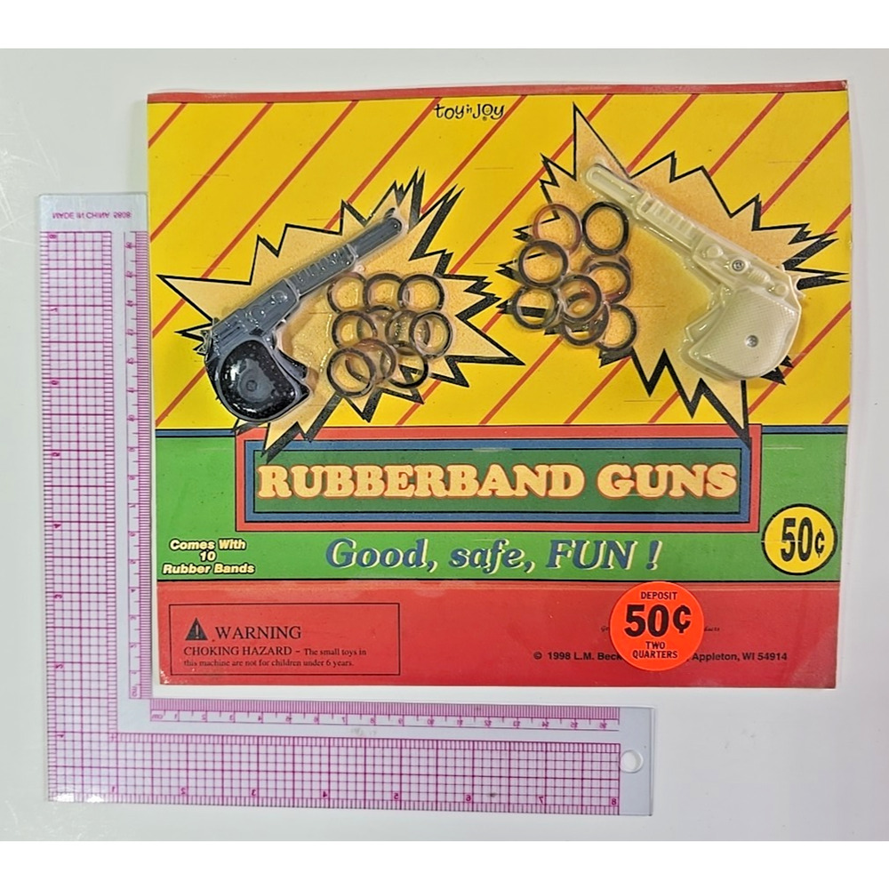 Vintage Vending Display Board Rubberband Guns 0632
